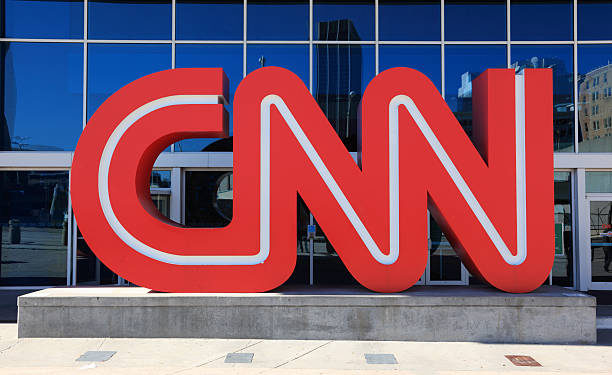 Atlanta, USA - October 19, 2011: Located in downtown Atlanta, Georgia next to Centennial Olympic Park, the CNN Center is the world headquarters of the Cable News Network (CNN). The building houses several newsrooms and studios for CNN's news channels along with this large CNN logo.