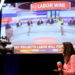 A TV presenter does a piece to camera with Sky News telecast up on the screen which projects that Anthony Albanese, leader of Australia's Labor Party, is going to be the next prime minister at Scott Morrison's election day event in Sydney, Australia May 21, 2022. REUTERS/Loren Elliott